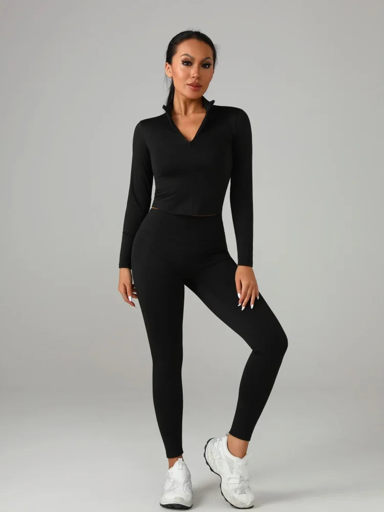 Black and white fitted women's solid-color set, perfect for fashion-conscious ladies and everyday fitness activities.